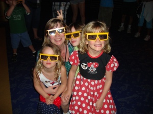 All the kids with their 3-D glasses waiting to see Disney's PhilharMagic.